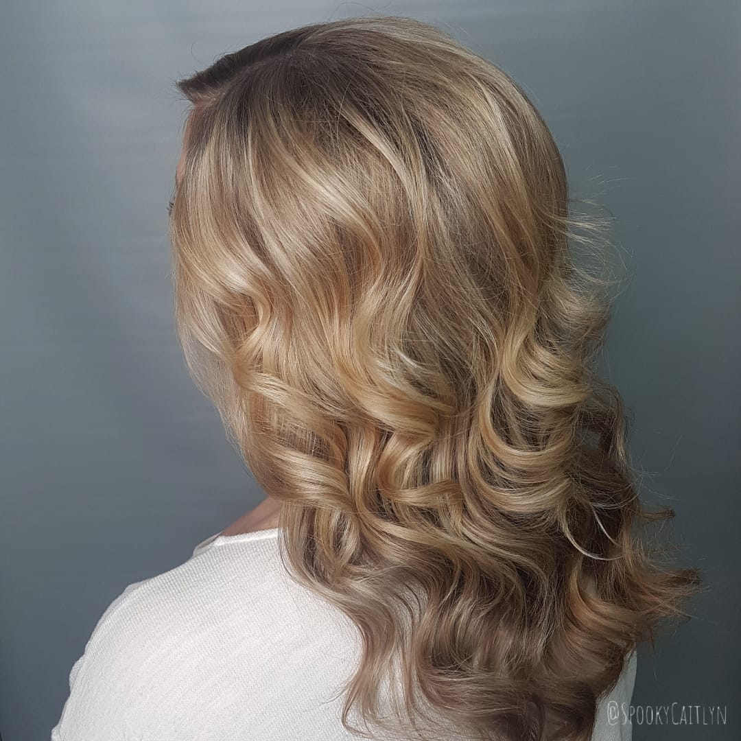 Blonde curly hair at hairstyle inn saskatoon