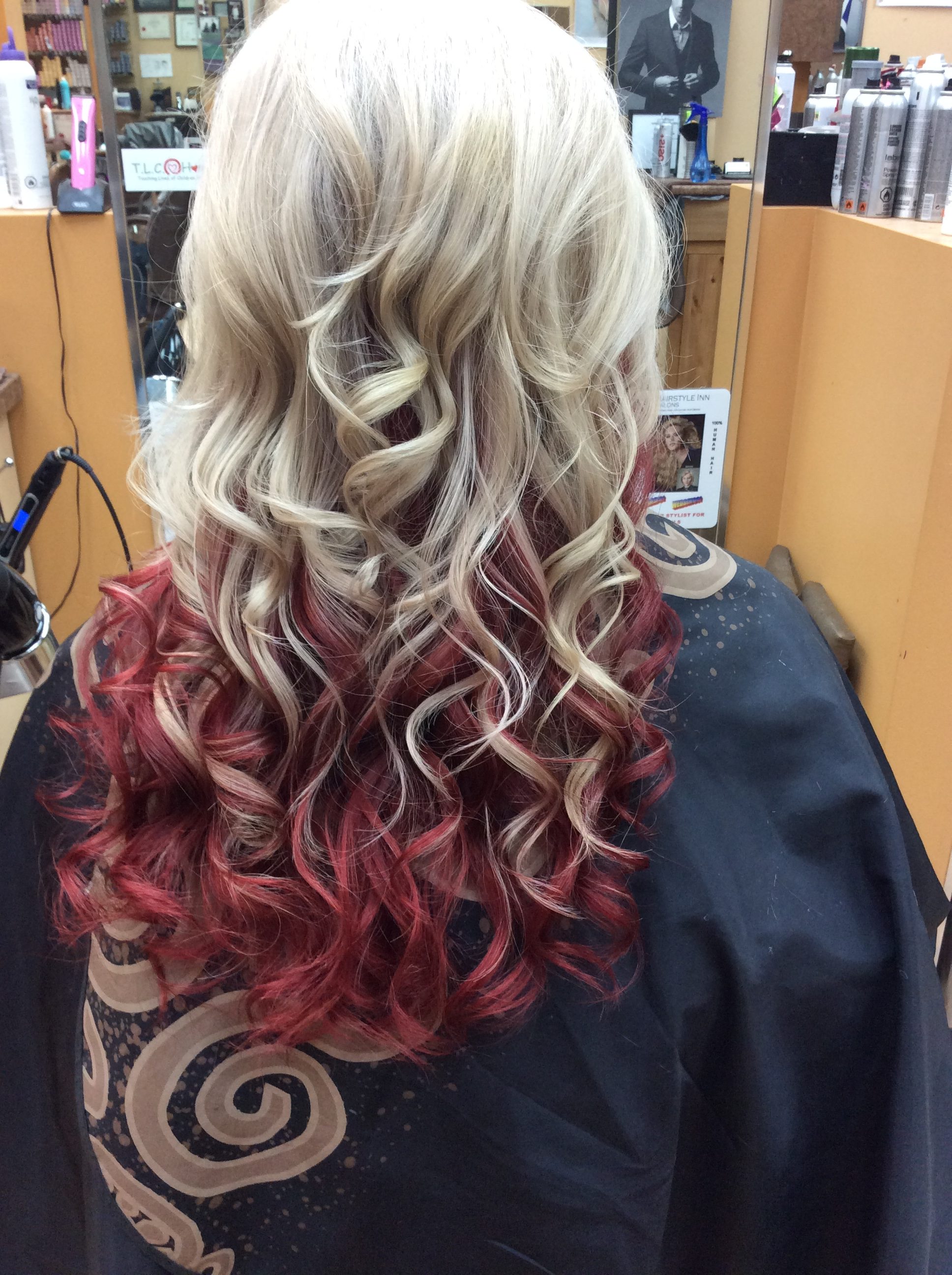 Blonde red curly hair at hairstyle inn saskatoon