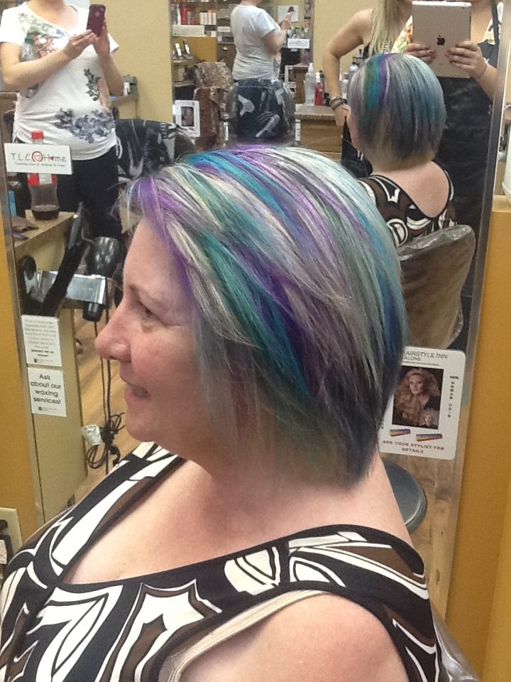 Short hair with colourful highlights at hairstyle inn saskatoon