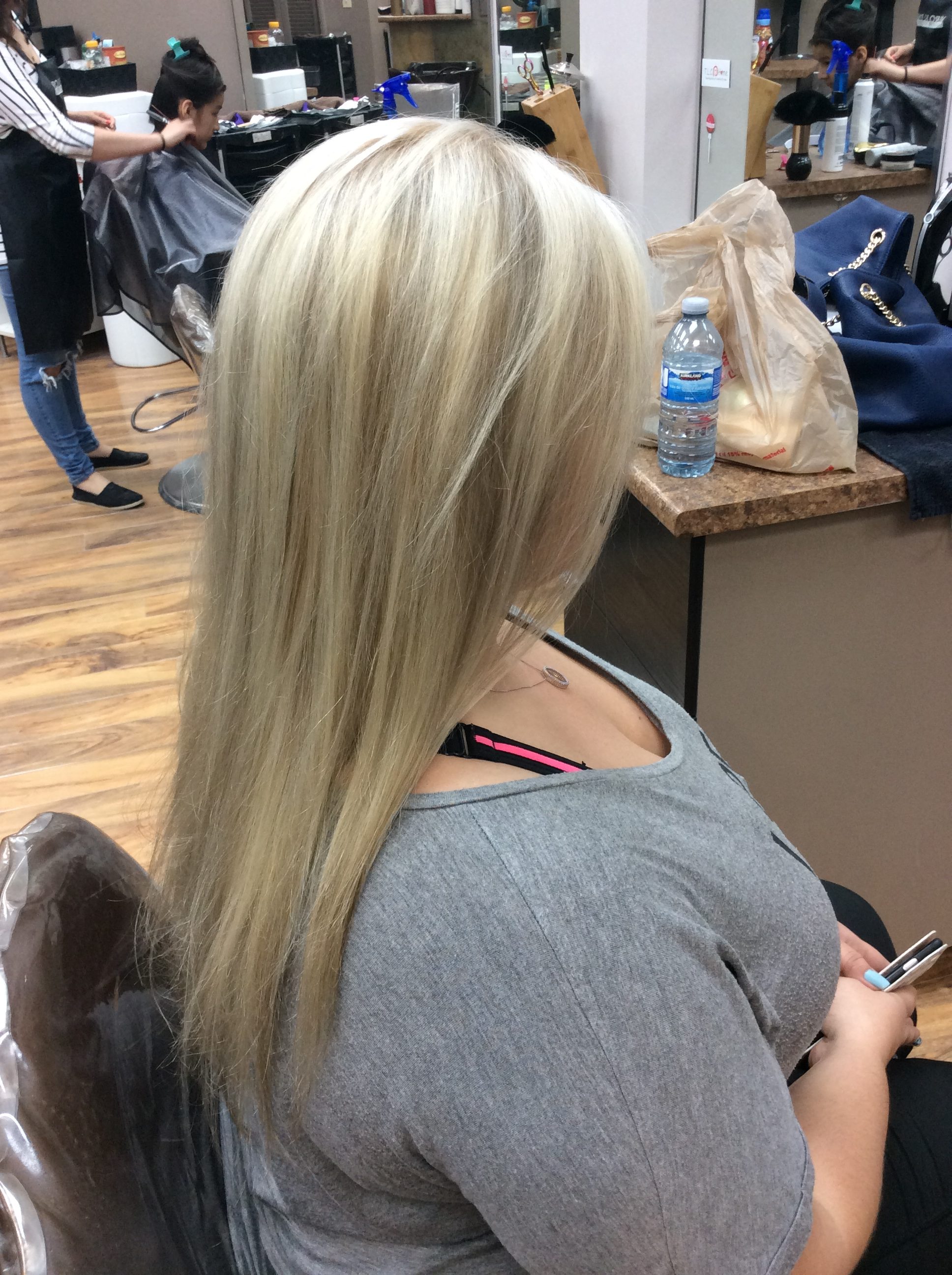 Long blonde hair colourist Saskatoon