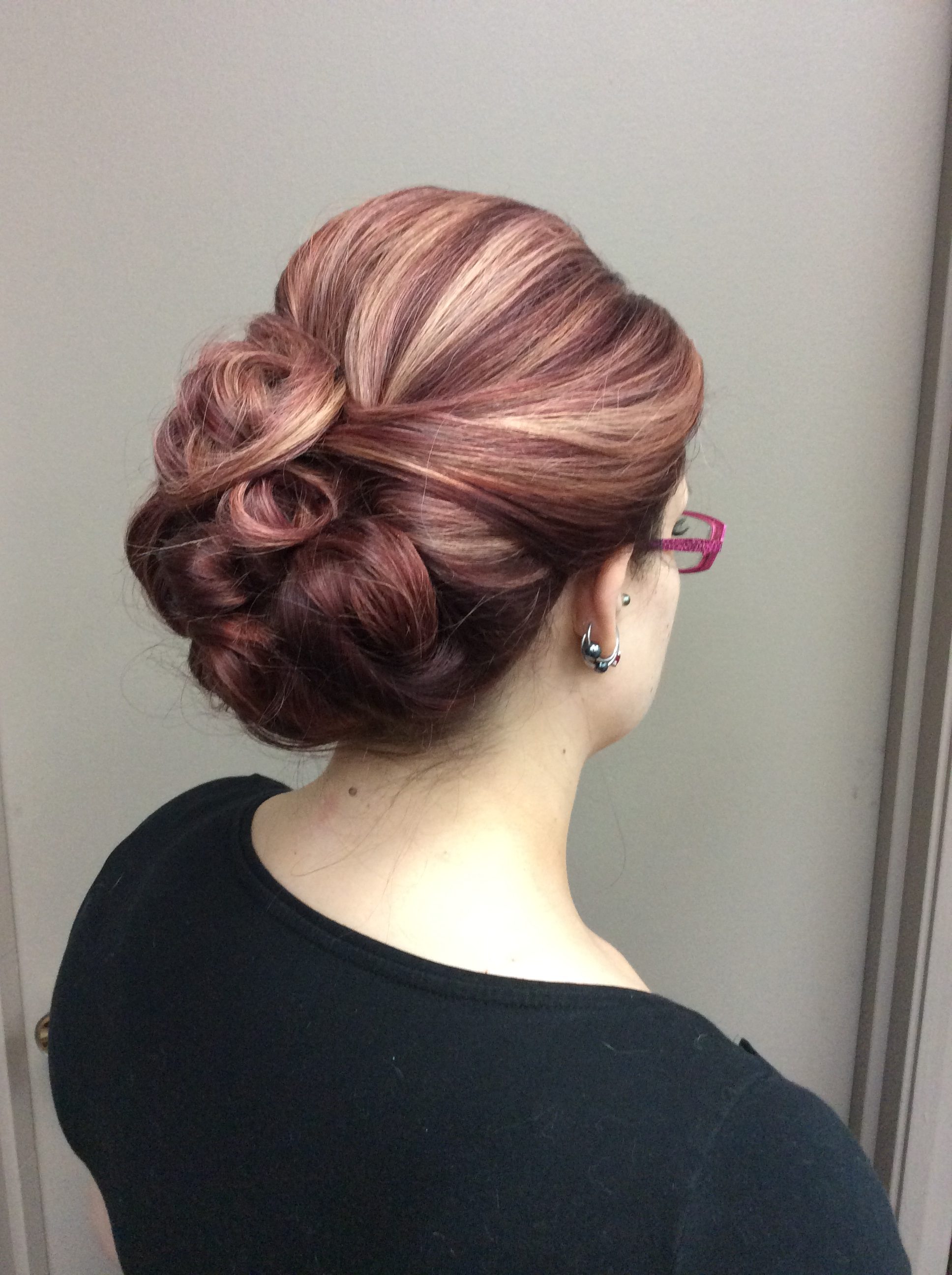 Side view of up-do hair style at hairstyle inn Saskatoon